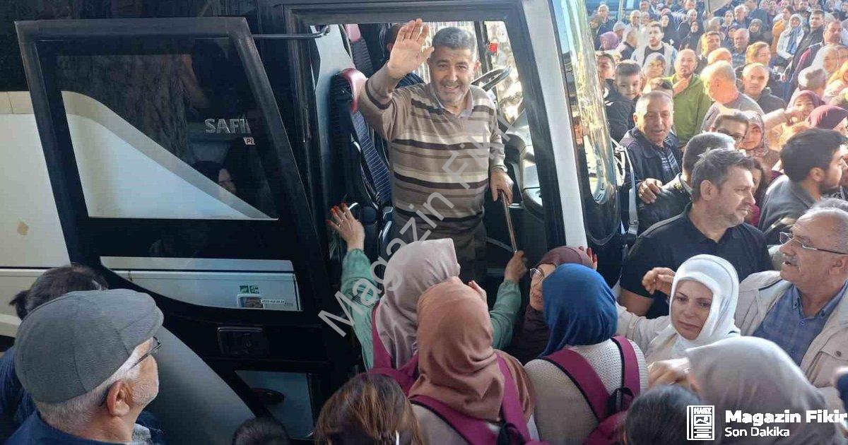 "Çine'den Kutsal Topraklara Yolculuk: 90 Umreci Dualarla Uğurlandı" başlıklı haber için fotorealisti